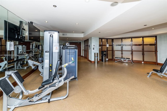 exercise room featuring recessed lighting and visible vents