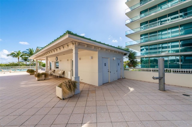 view of patio with a community pool