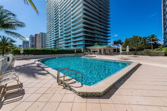 pool with a patio