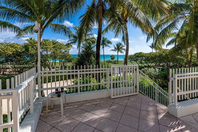 view of patio featuring a water view