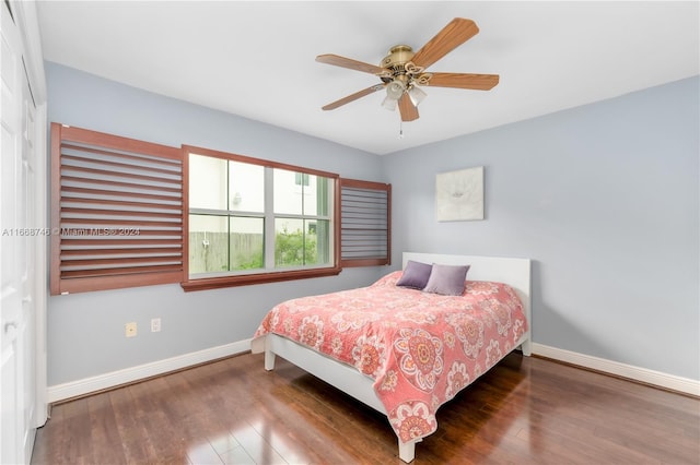 bedroom featuring wood-type flooring and ceiling fan