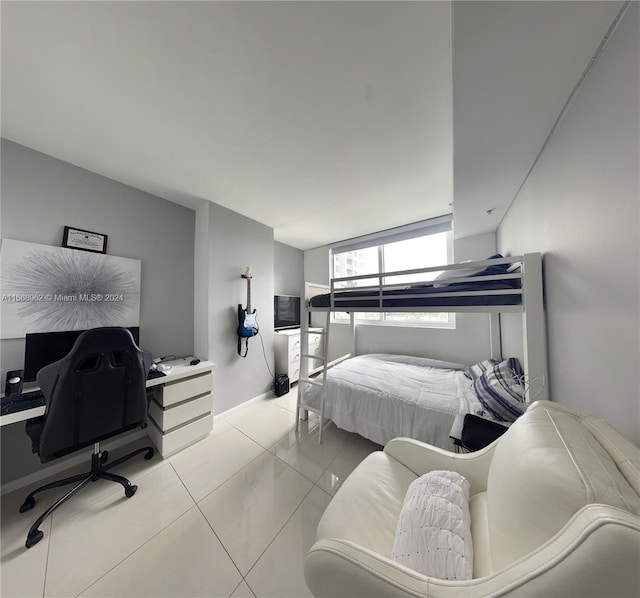 bedroom featuring light tile patterned floors