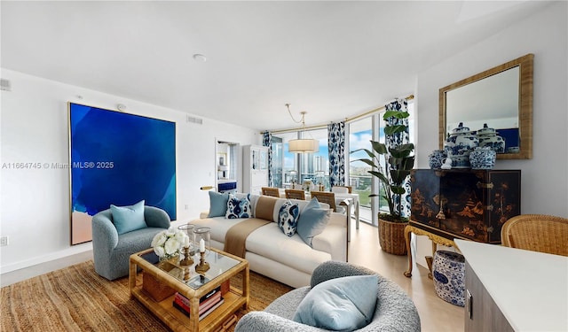 living room with floor to ceiling windows