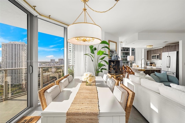 488 NE 18th St Unit 2301, Miami, FL 33132 - dining space featuring a view of city and expansive windows
