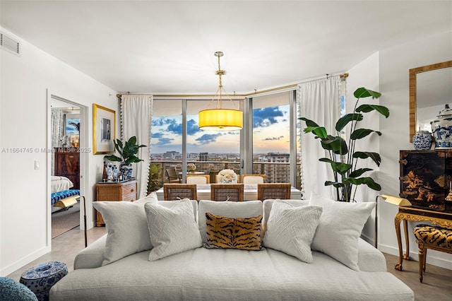 488 NE 18th St Unit 2301, Miami, FL 33132 - bedroom with concrete flooring, baseboards, visible vents, and floor to ceiling windows