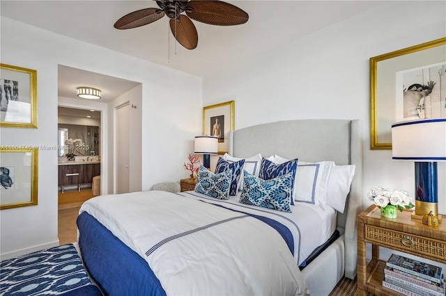 bedroom featuring ensuite bathroom and ceiling fan