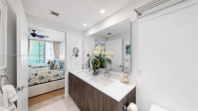 488 NE 18th St Unit 2301, Miami, FL 33132 - full bath featuring double vanity, a ceiling fan, visible vents, a sink, and ensuite bath