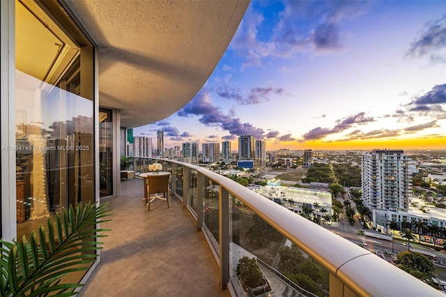 488 NE 18th St Unit 2301, Miami, FL 33132 - balcony at dusk featuring a view of city