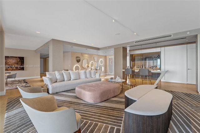 living room with hardwood / wood-style flooring