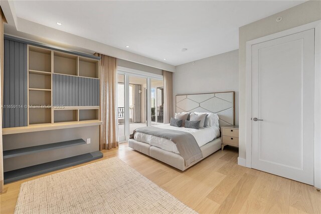 bedroom with light wood-type flooring