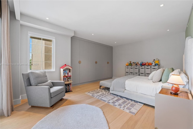 bedroom featuring light wood-type flooring