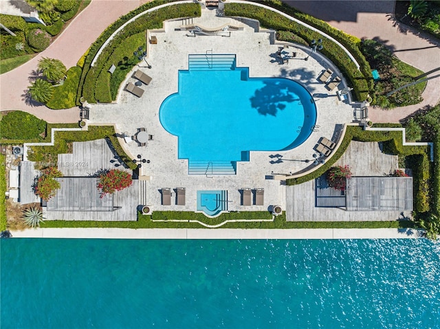 view of swimming pool featuring a patio area