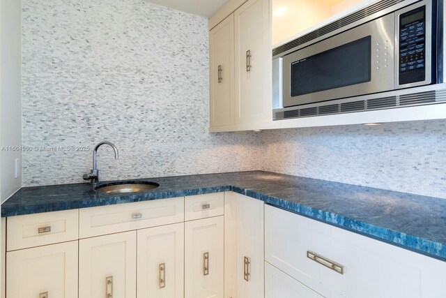 bathroom featuring a shower with shower door, a bidet, vanity, and toilet