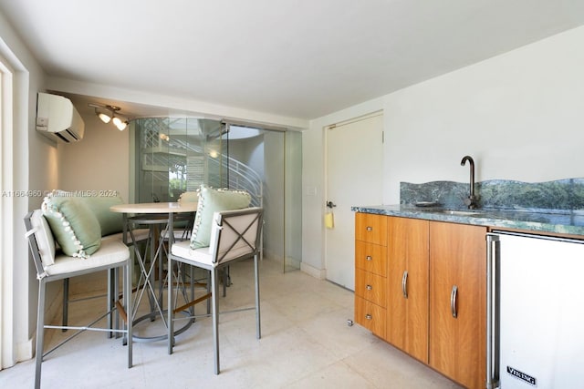 dining space featuring an AC wall unit