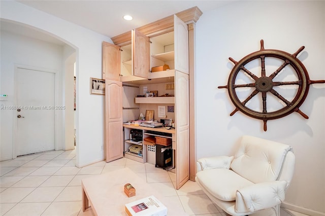 sitting room featuring light tile patterned floors