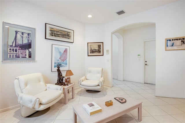 living area featuring light tile patterned floors