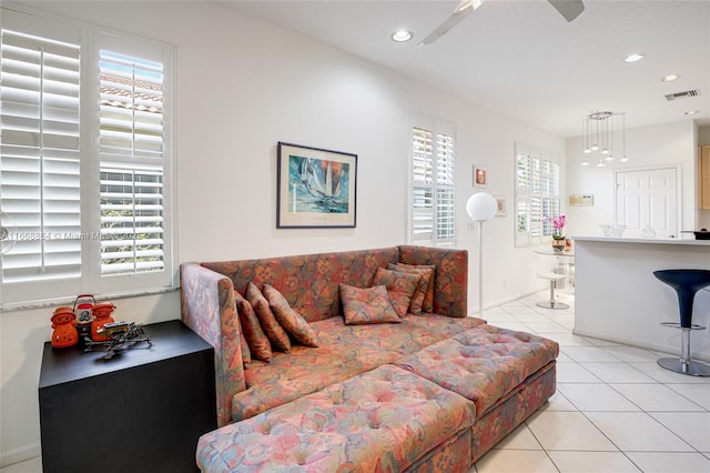 tiled bedroom with multiple windows