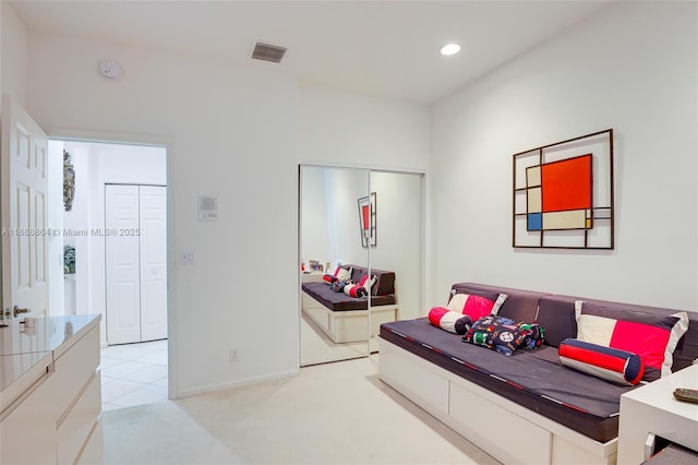 living room featuring light carpet