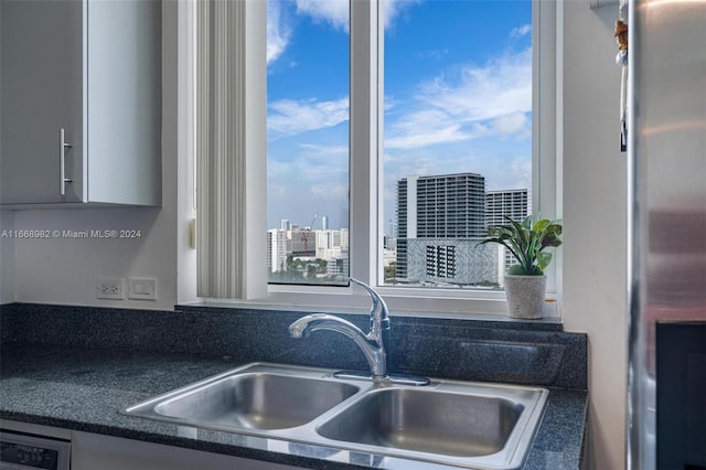 kitchen featuring sink, stainless steel appliances, and plenty of natural light