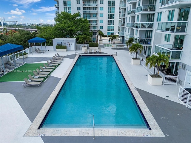 view of pool featuring a gazebo and a patio area