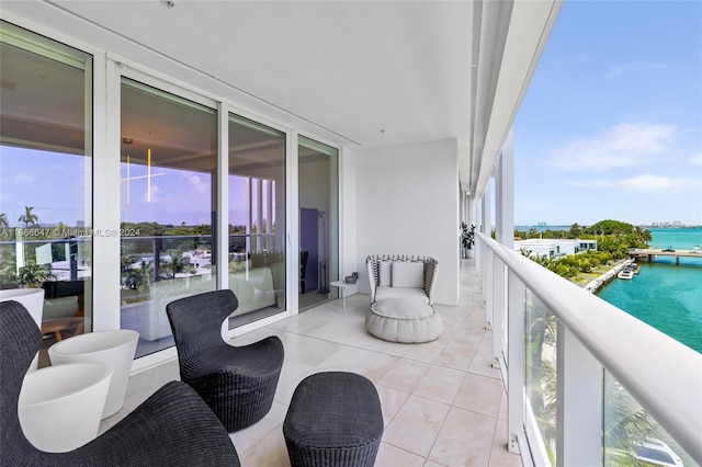 balcony featuring a water view