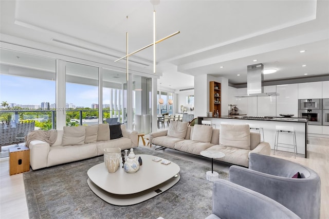 living room with light hardwood / wood-style floors