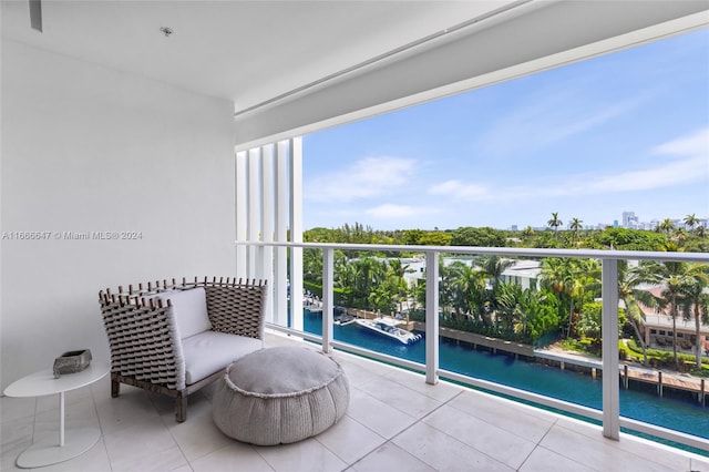 balcony featuring a water view