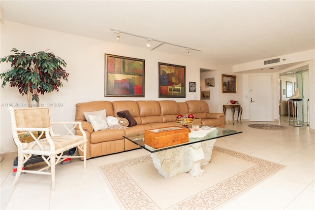 living room with tile patterned floors