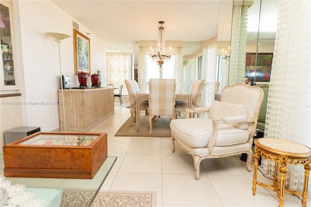 tiled dining area with a notable chandelier