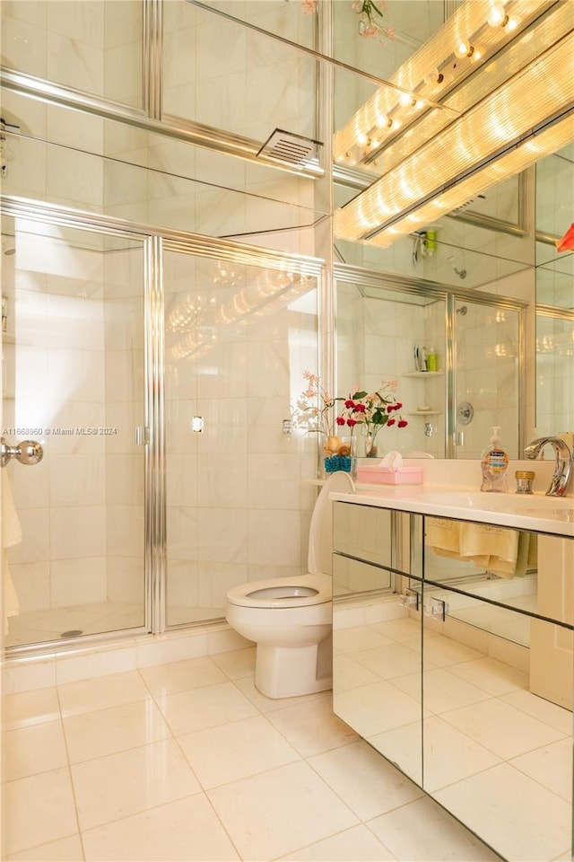 carpeted bedroom featuring a textured ceiling and ensuite bathroom