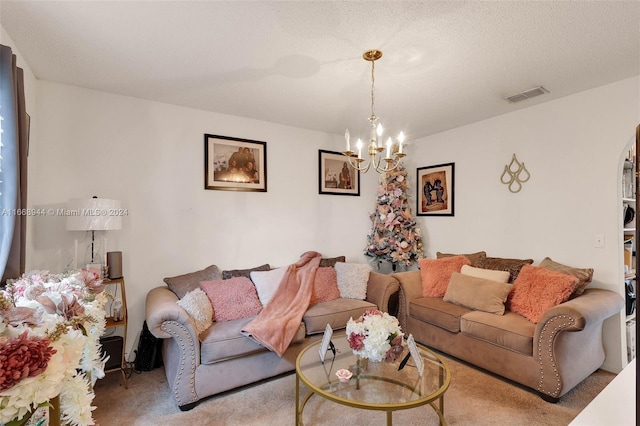 living room featuring a textured ceiling, light colored carpet, and a notable chandelier