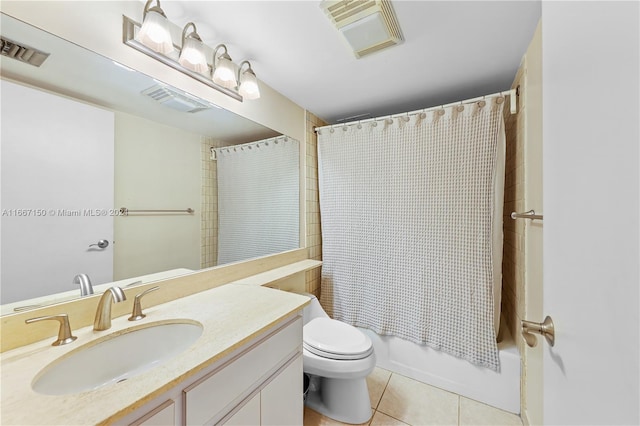 full bathroom featuring vanity, shower / tub combo with curtain, toilet, and tile patterned flooring