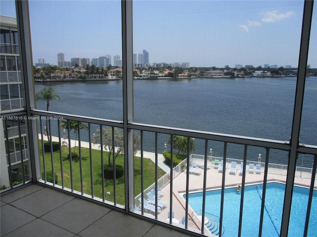 balcony featuring a water view