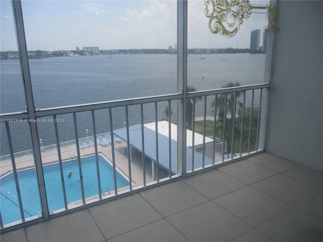 balcony featuring a water view