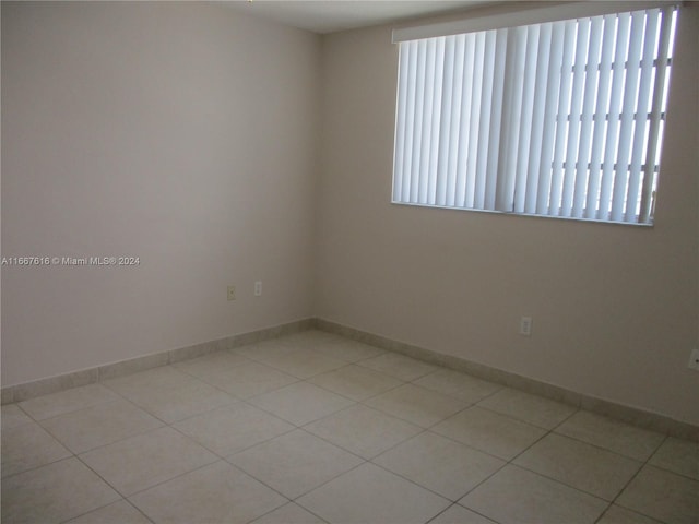 view of tiled spare room