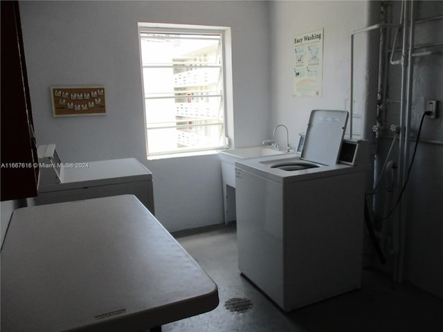 washroom featuring washer and dryer