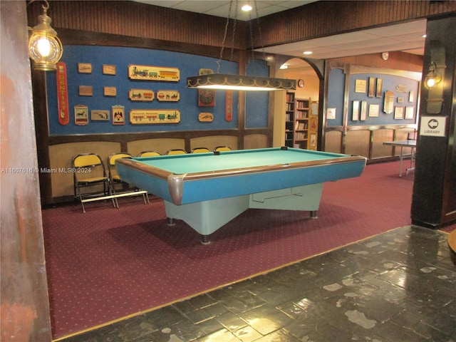 game room with dark colored carpet and pool table