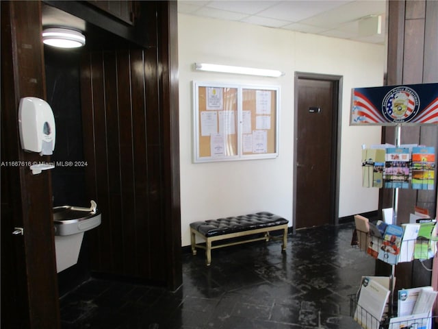 bathroom with a drop ceiling