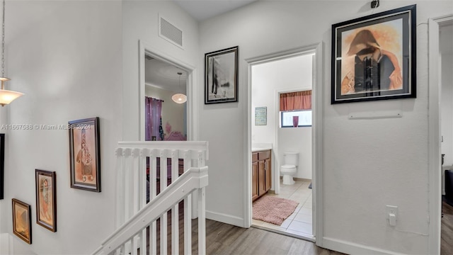 hallway featuring light hardwood / wood-style flooring