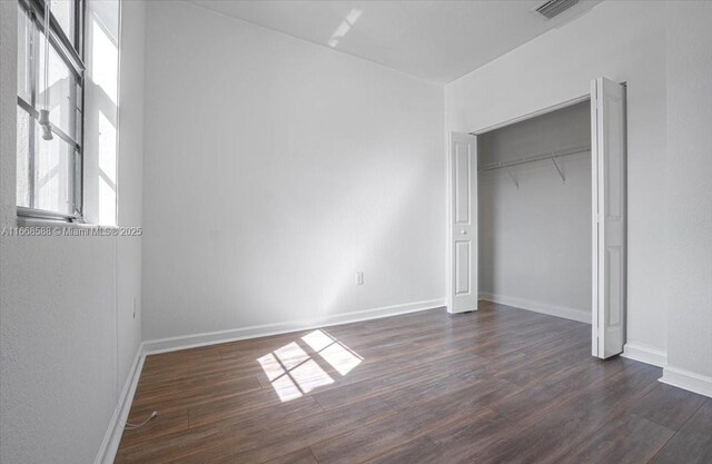 bathroom featuring walk in shower and vanity