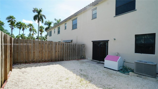 exterior space with a patio and central air condition unit