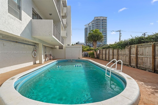 view of pool with a patio