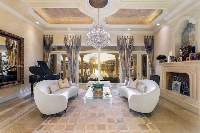 living room with coffered ceiling, crown molding, a tray ceiling, french doors, and a notable chandelier