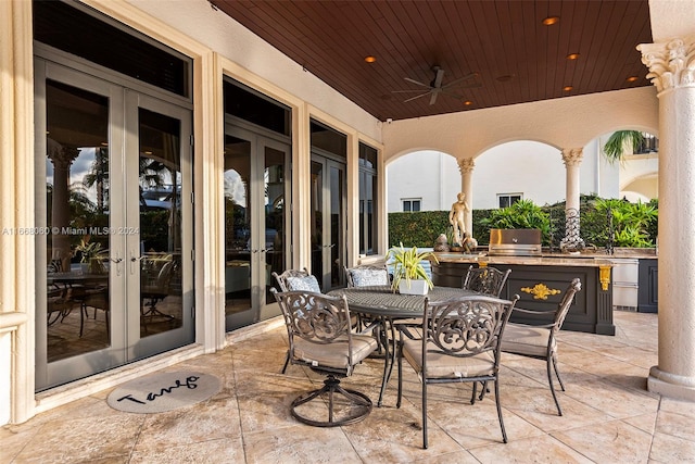 view of patio / terrace with area for grilling, french doors, and an outdoor kitchen