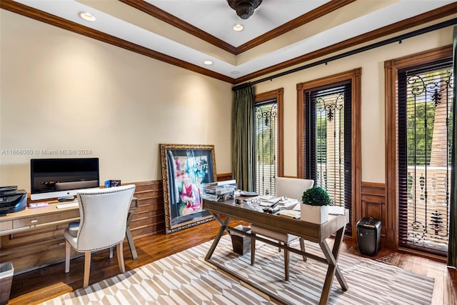 office with wood-type flooring and ornamental molding