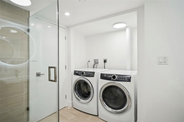 laundry area with separate washer and dryer