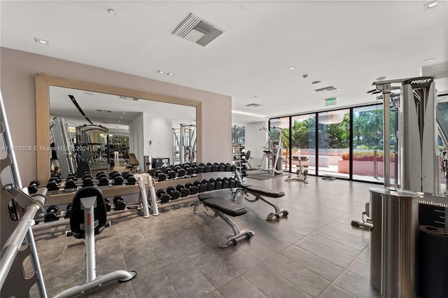 workout area with a wall of windows