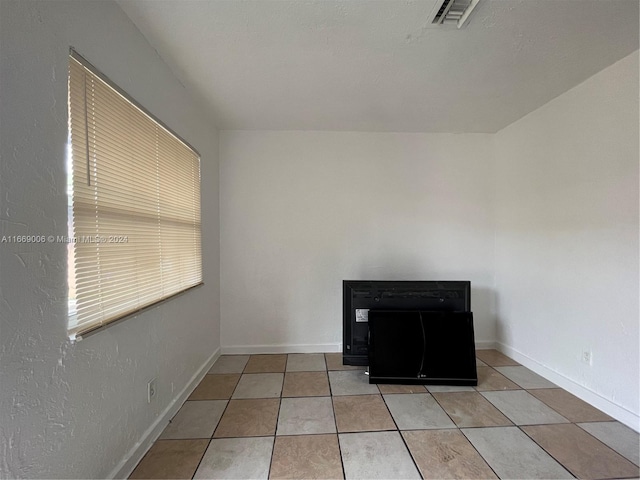 interior details with baseboards and visible vents