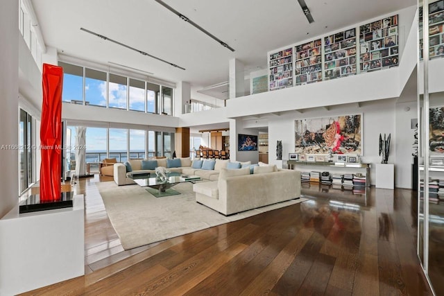 450 Alton Rd Unit Ph2, Miami Beach, FL 33139 - living area with a high ceiling and wood-type flooring