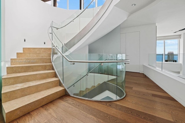 450 Alton Rd Unit Ph2, Miami Beach, FL 33139 - stairs featuring wood finished floors